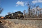 NS 9508 takes a train East